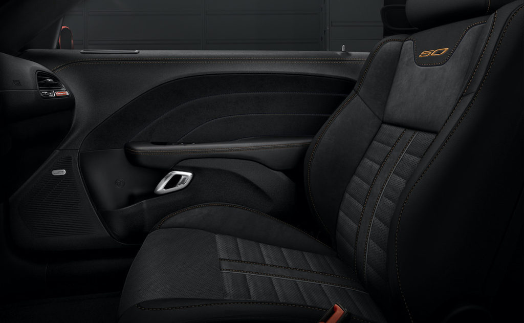 Black, heated and ventilated Nappa leather and Alcantara suede performance seats feature Sepia accent stitching and embroidered “50” logo seat backs on Challenger 50th Anniversary Edition models.