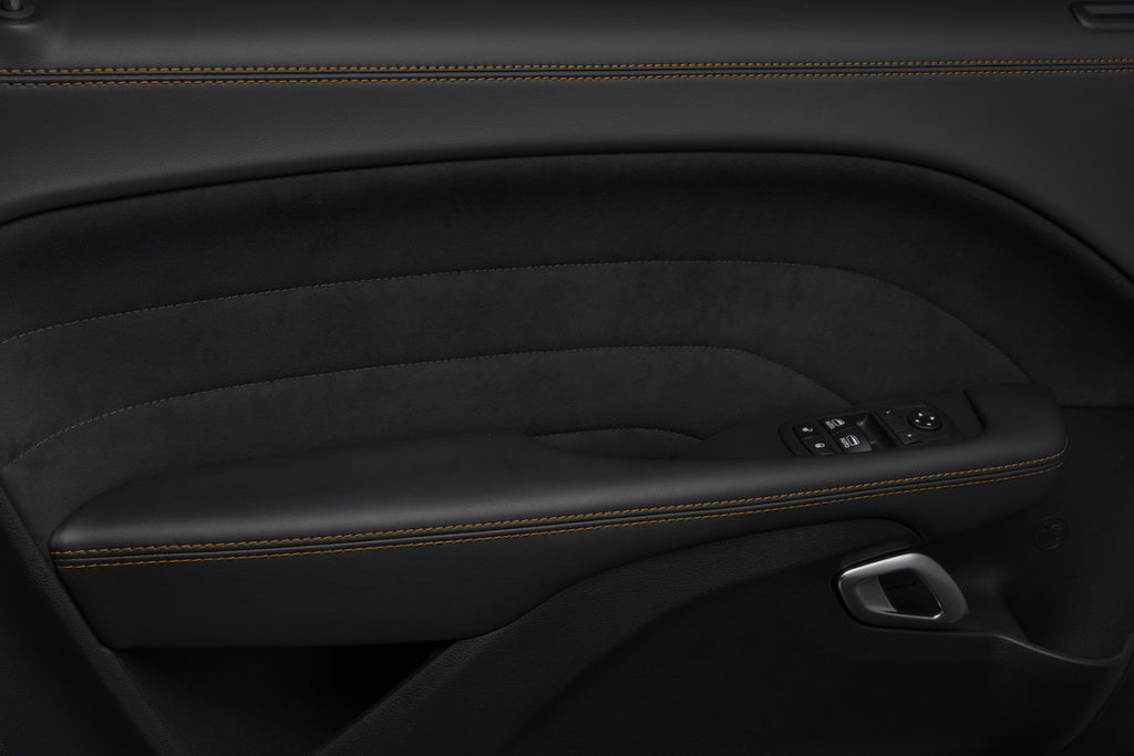 Alcantara door bolsters feature a unique accent stitch, creating a premium cockpit feel that is unique to the 50th Anniversary Edition.