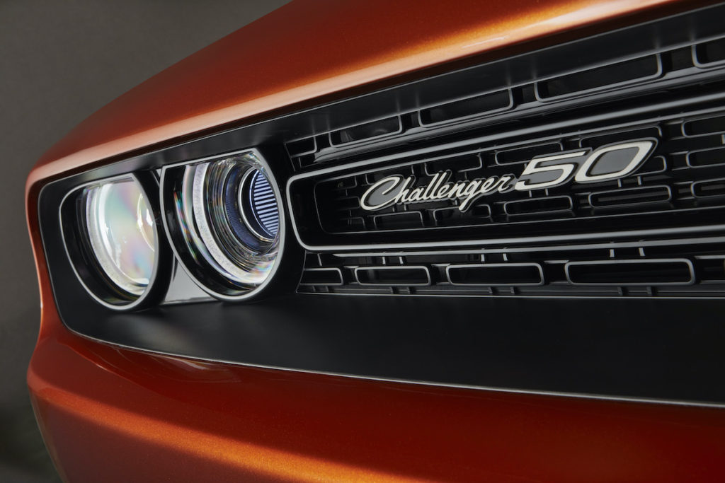 Challenger 50th Anniversary logo badges appear on the grille and spoiler in new “Gold School” finish on Challenger 50th Anniversary Edition models.